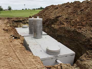 Concrete septic tank.